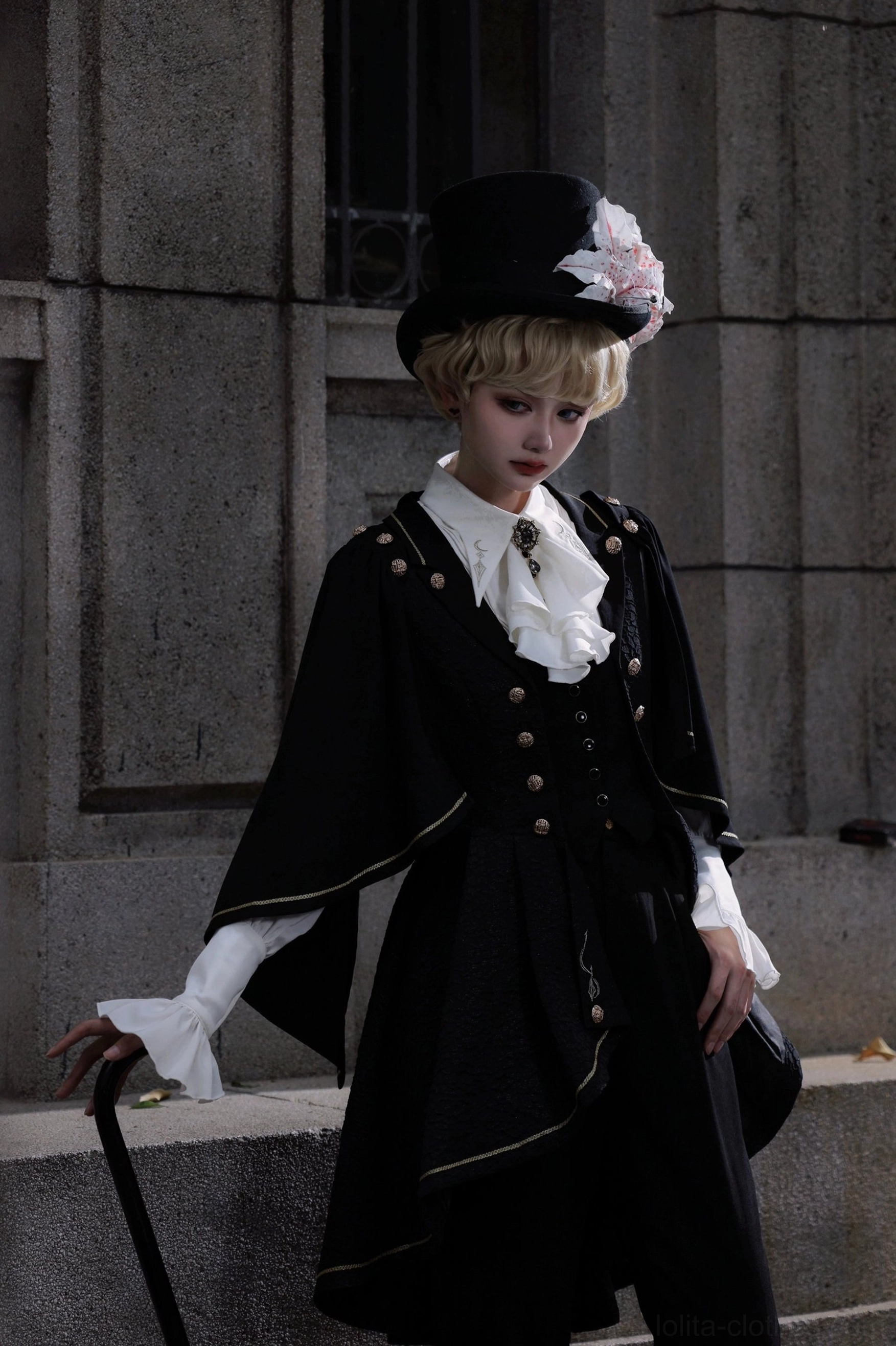 Fallen Moon Rule military lolita in cosplay event setting, model in full ensemble at convention booth or photoshoot