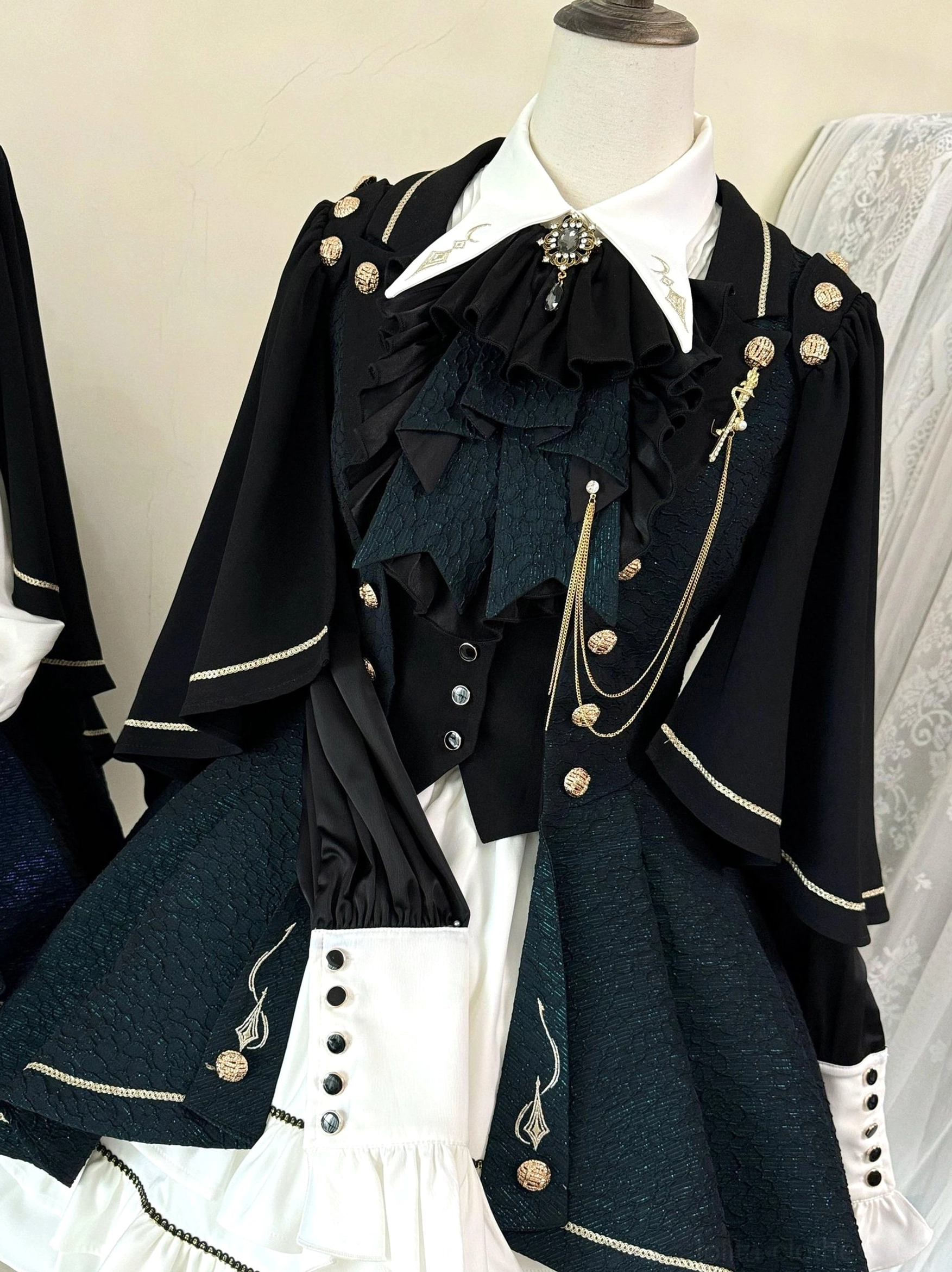 Fallen Moon Rule military lolita costume styling example, model in full gothic military lolita outfit with complementary accessories and footwear coordination