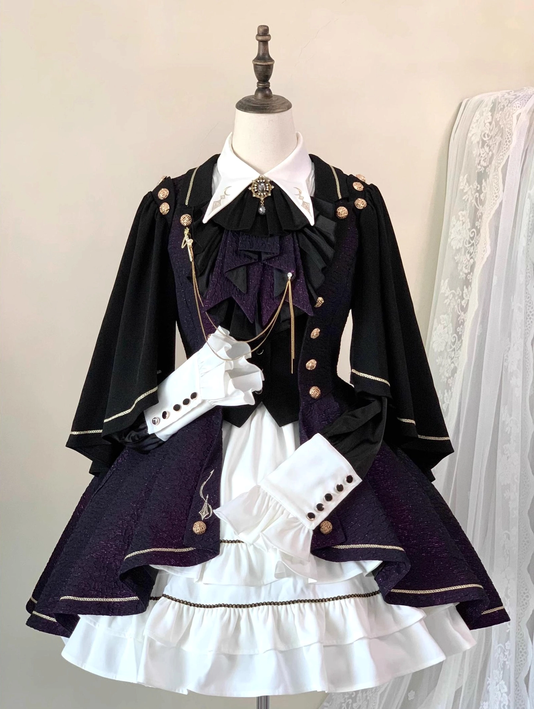 Fallen Moon Rule military lolita fabric texture close-up, showing satin crepe blouse finish and 450G TR polyester-cotton blend weight quality