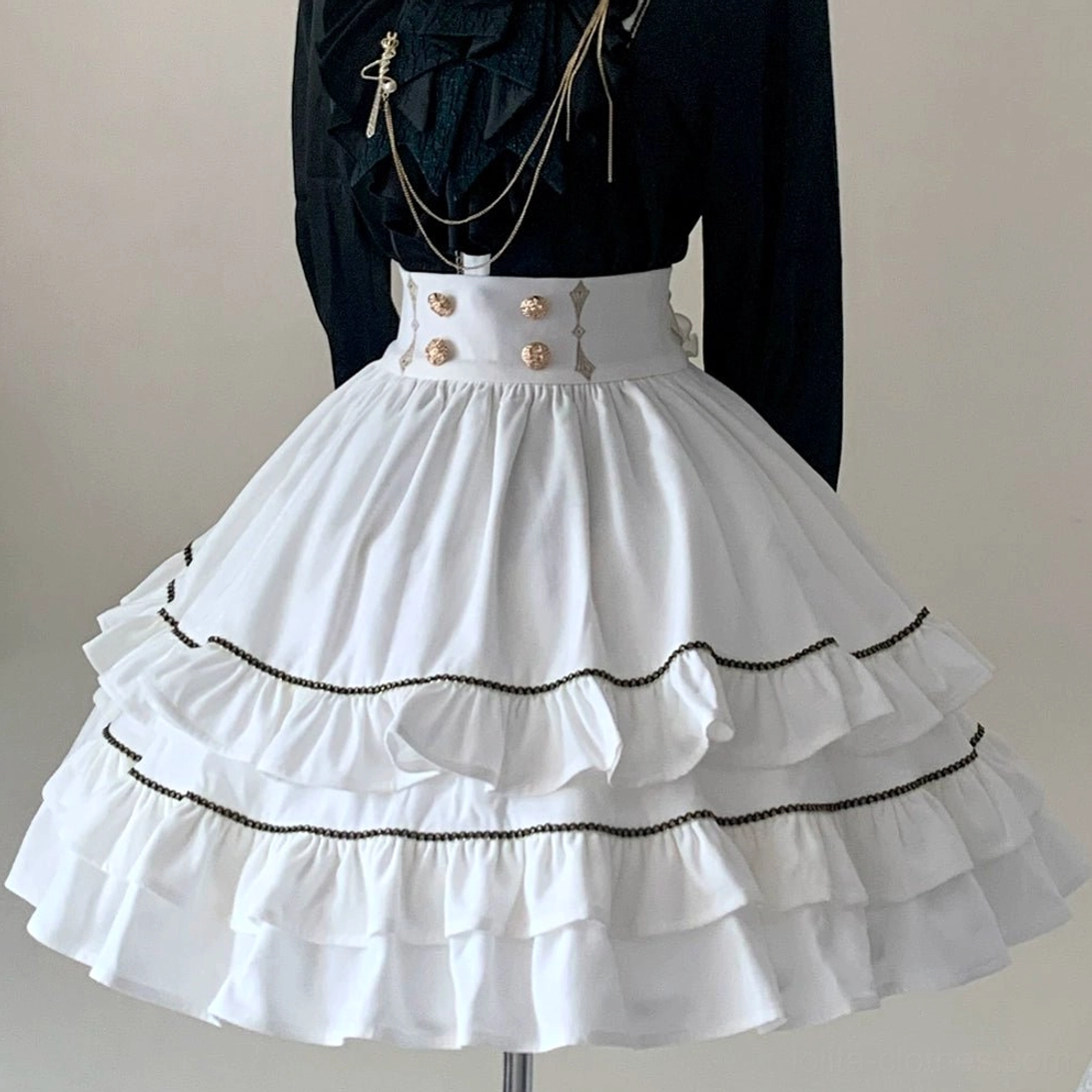 Fallen Moon Rule military lolita styled with formal gloves and wristbands, demonstrating refined accessory coordination