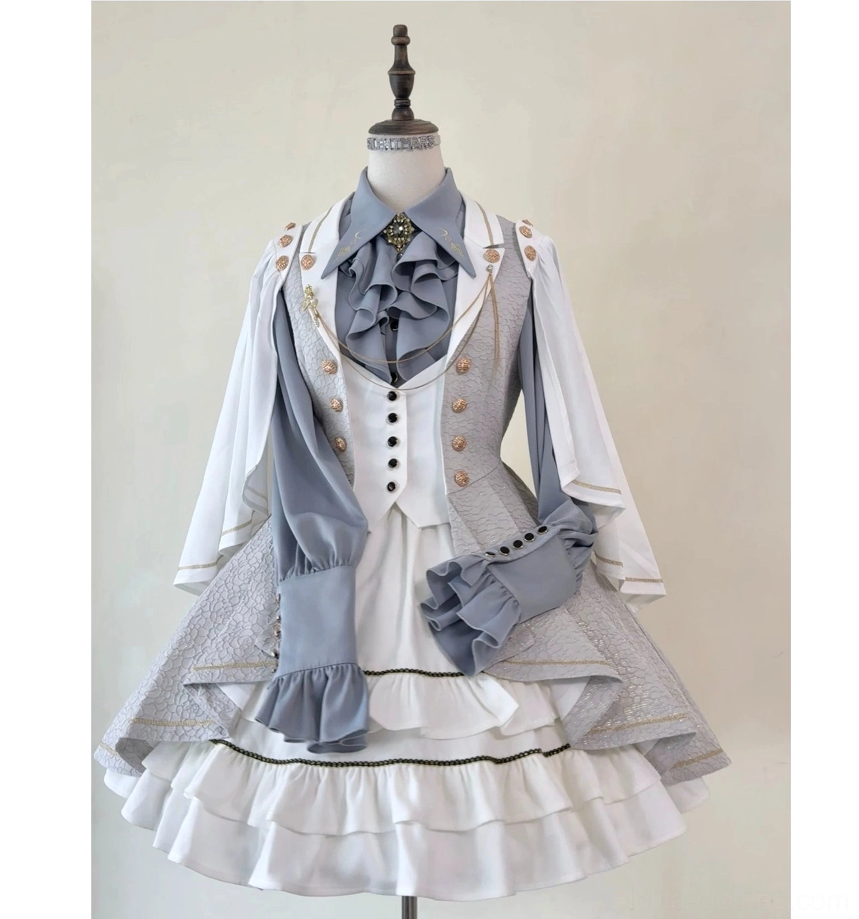 Fallen Moon Rule grey and cream white retro military lolita dress set, frontal mannequin display on light background, featuring tiered ruffled white skirt, layered grey ascot tie, gold button decorations, and detachable matching gloves