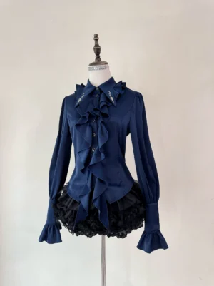 Fallen Moon Rule military lolita blouse and skirt set in navy blue, frontal display on mannequin, featuring stand collar, ruffled front placket, satin fabric sheen, flared long sleeves, and black ruffled underskirt