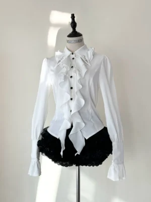 Fallen Moon Rule military lolita blouse and skirt set in white and cream, frontal view on mannequin, showing embroidered collar, gold buttons, ruffled placket, fitted silhouette, and tiered ruffle skirt