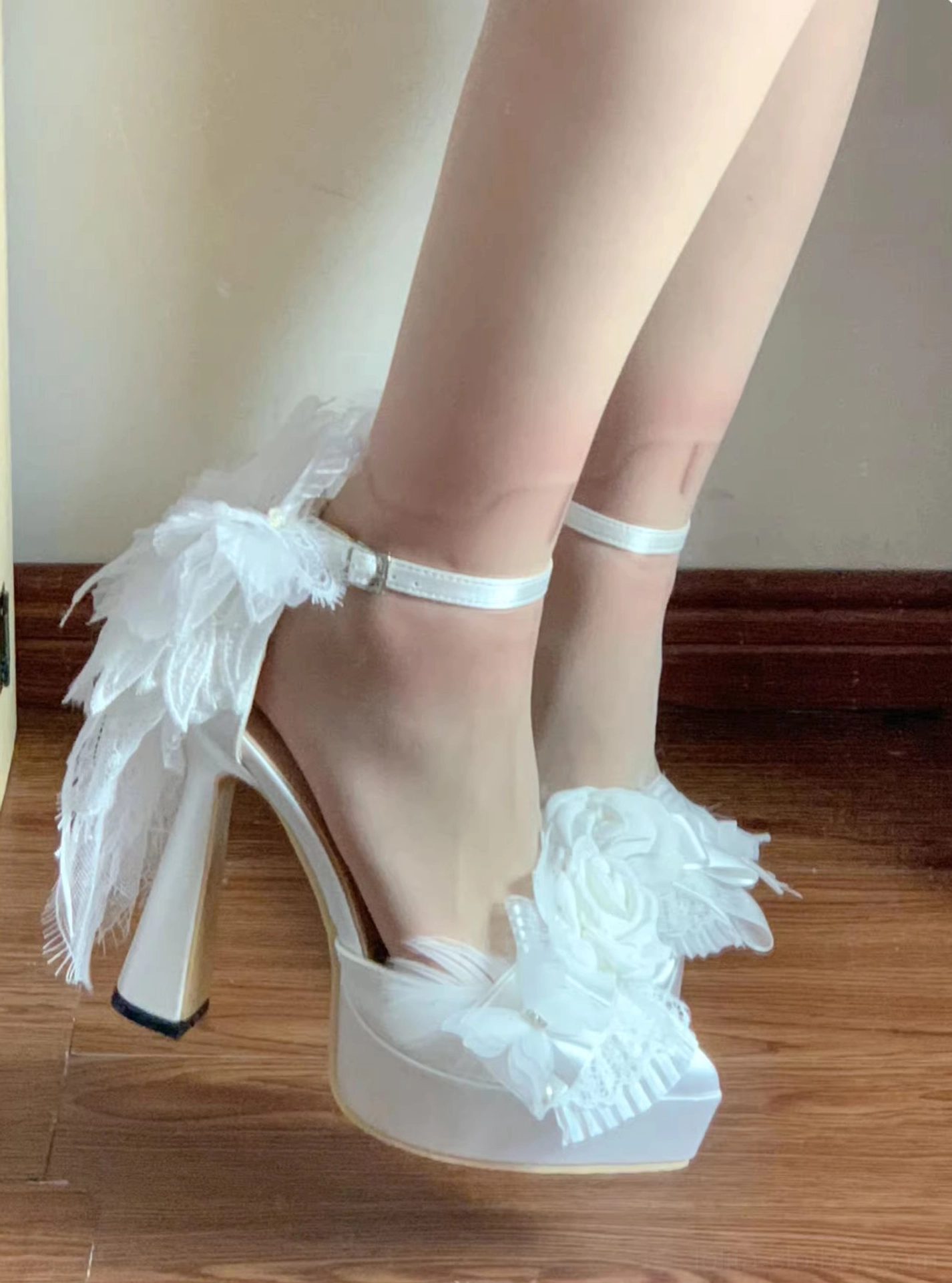 Feather spirit lolita platform heel shoes care and maintenance instruction detail, showing delicate feather handling, satin material protection, and storage recommendations