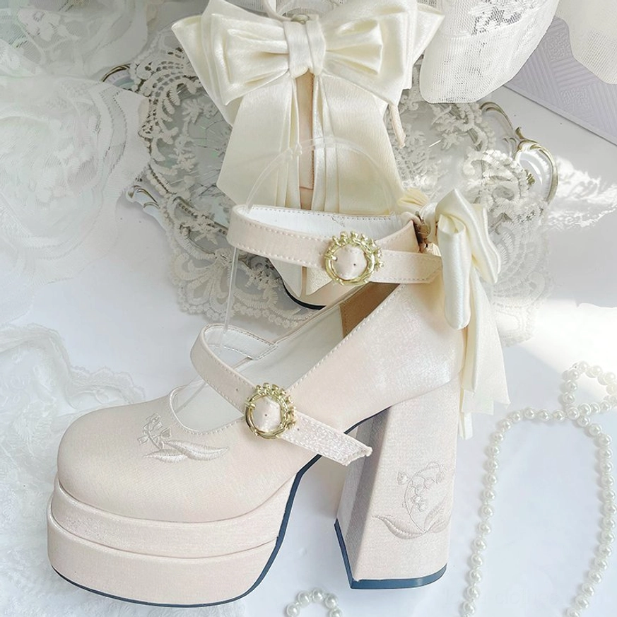 Champagne beige elegant floating dream lily lolita platform high heels with sophisticated metallic sheen and delicate satin back bow for classic lolita styling