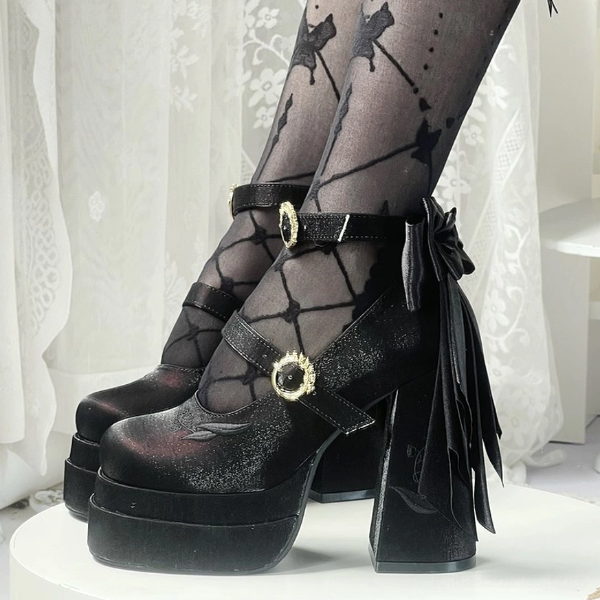 Lily-of-the-valley embroidery detail and botanical inspiration of floating dream lily lolita heels, showing cultural significance and design philosophy