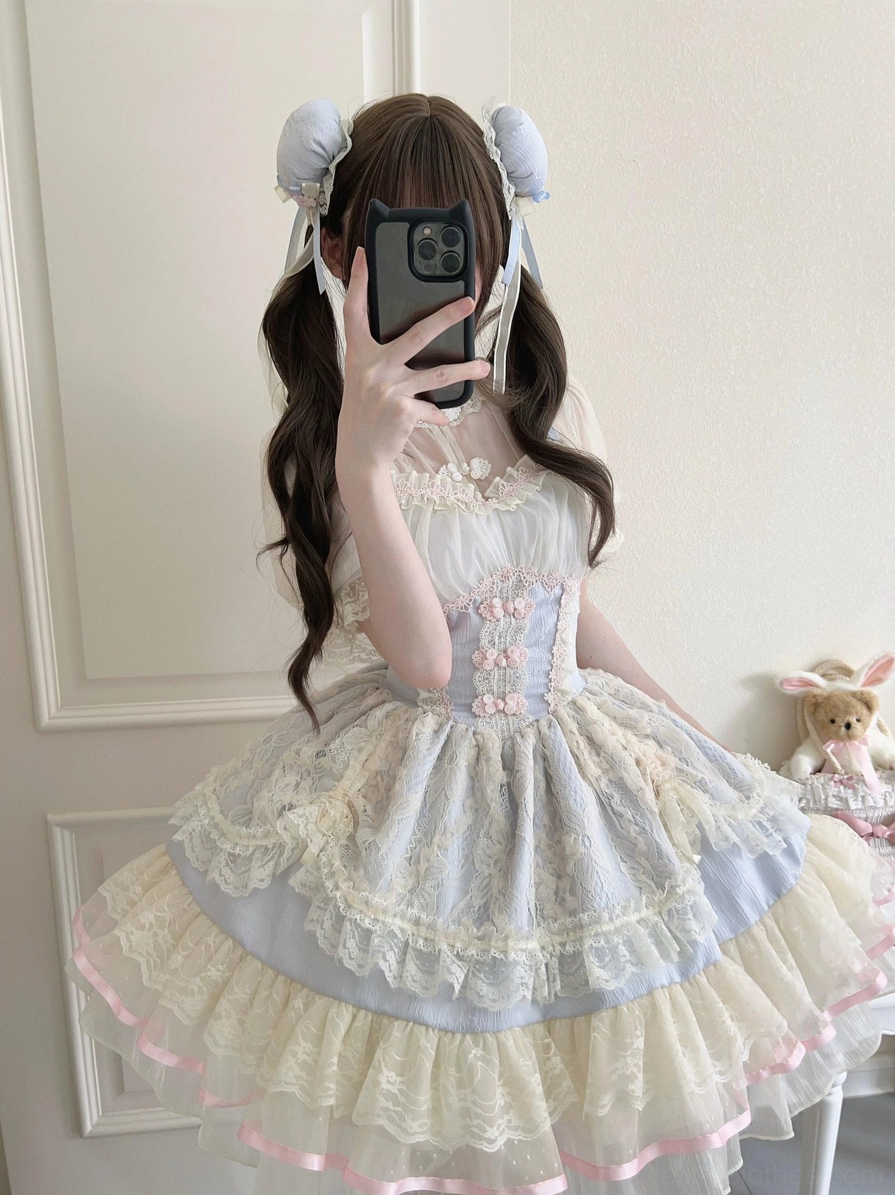 Pastel blue ballet style lolita jsk dress front mirror view with lace trims tiered ruffled skirt and fitted corset bodice