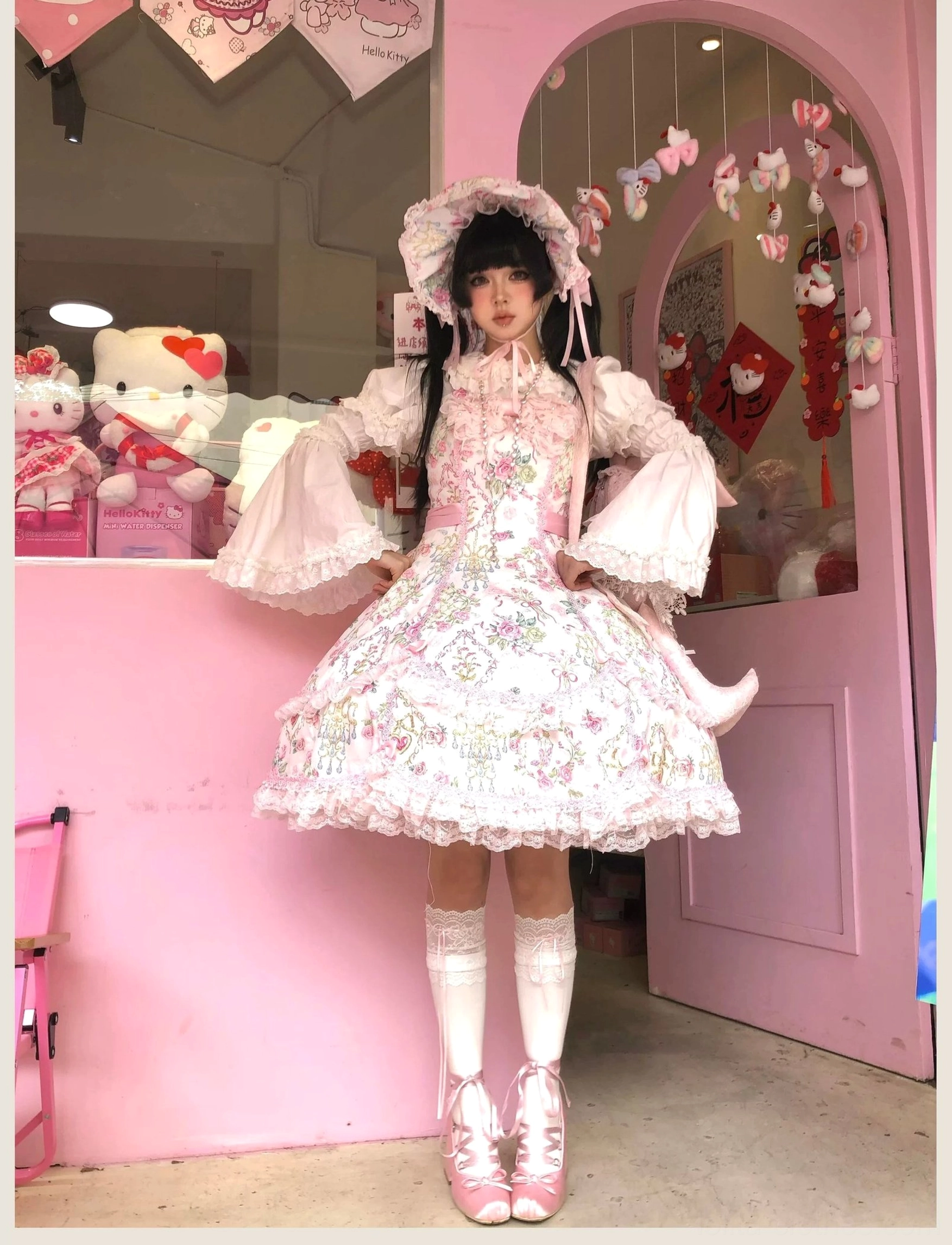Floral old school Lolita JSK dress worn at lolita community meetup event with coordinated friends in group setting