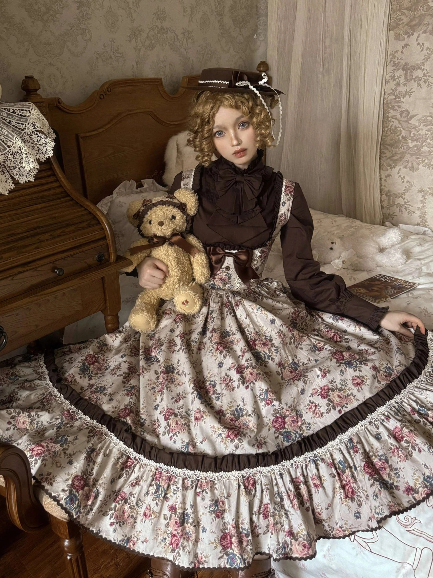 Floral Reverie Old School Lolita JSK close-up front view on model full floral print skirt lace brown hem trim matching vintage hat and inner top
