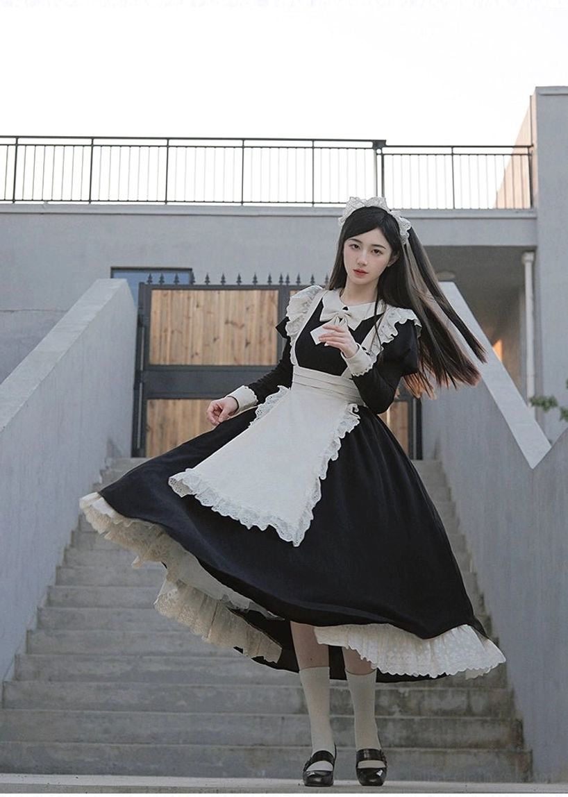 Flowing maid lolita dress with ruffled skirt hem and fitted bodice worn during dynamic spinning motion