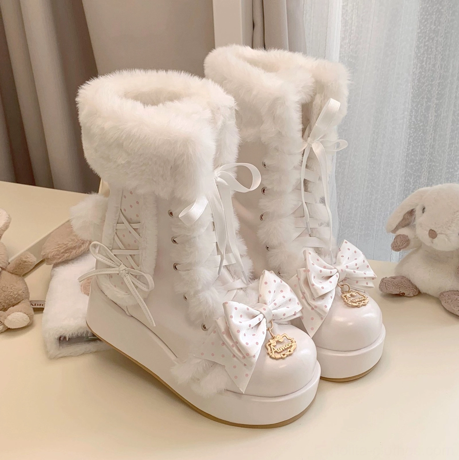 Fluffy bunny ear sweet lolita platform boots detail photography highlighting plush texture, decorative bunny ear design, polka dot bow accents, metallic ornaments, and craftsmanship quality