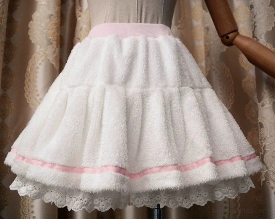 Fluffy pink elastic waist lolita skirt with delicate lace hem details, designed to coordinate with cat ear plush coat sets
