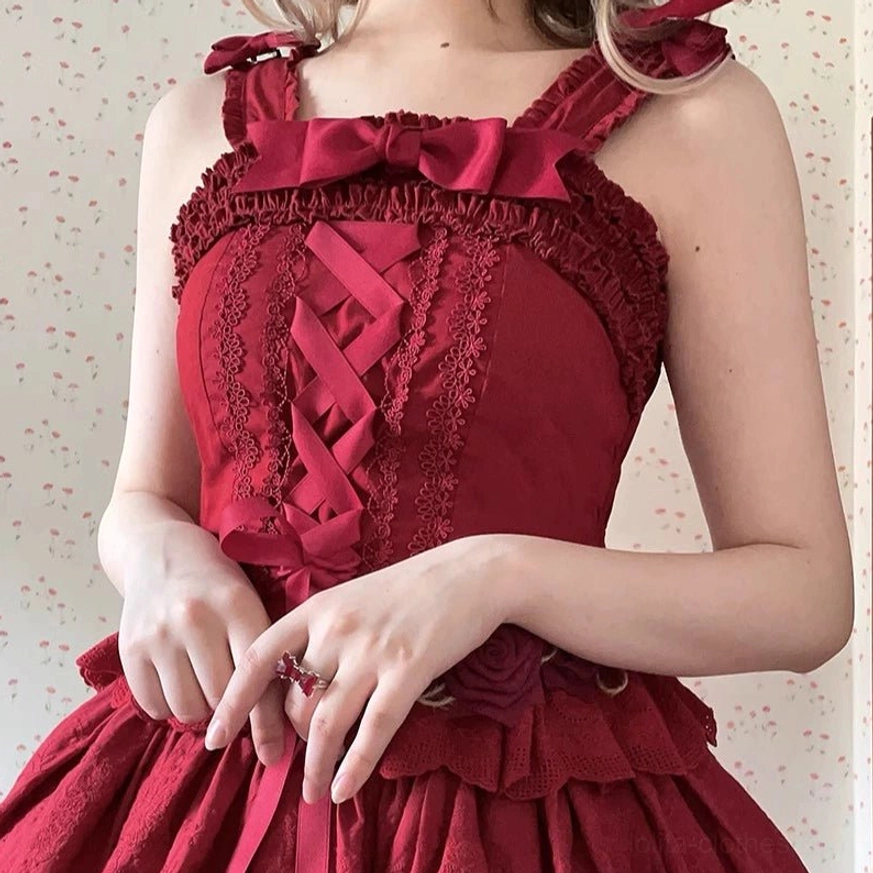 Burgundy wine red Forest Waltz lolita camisole featuring large satin bow on neckline, ruffled lace trim, front lace-up design with ruffled skirt hem on model torso