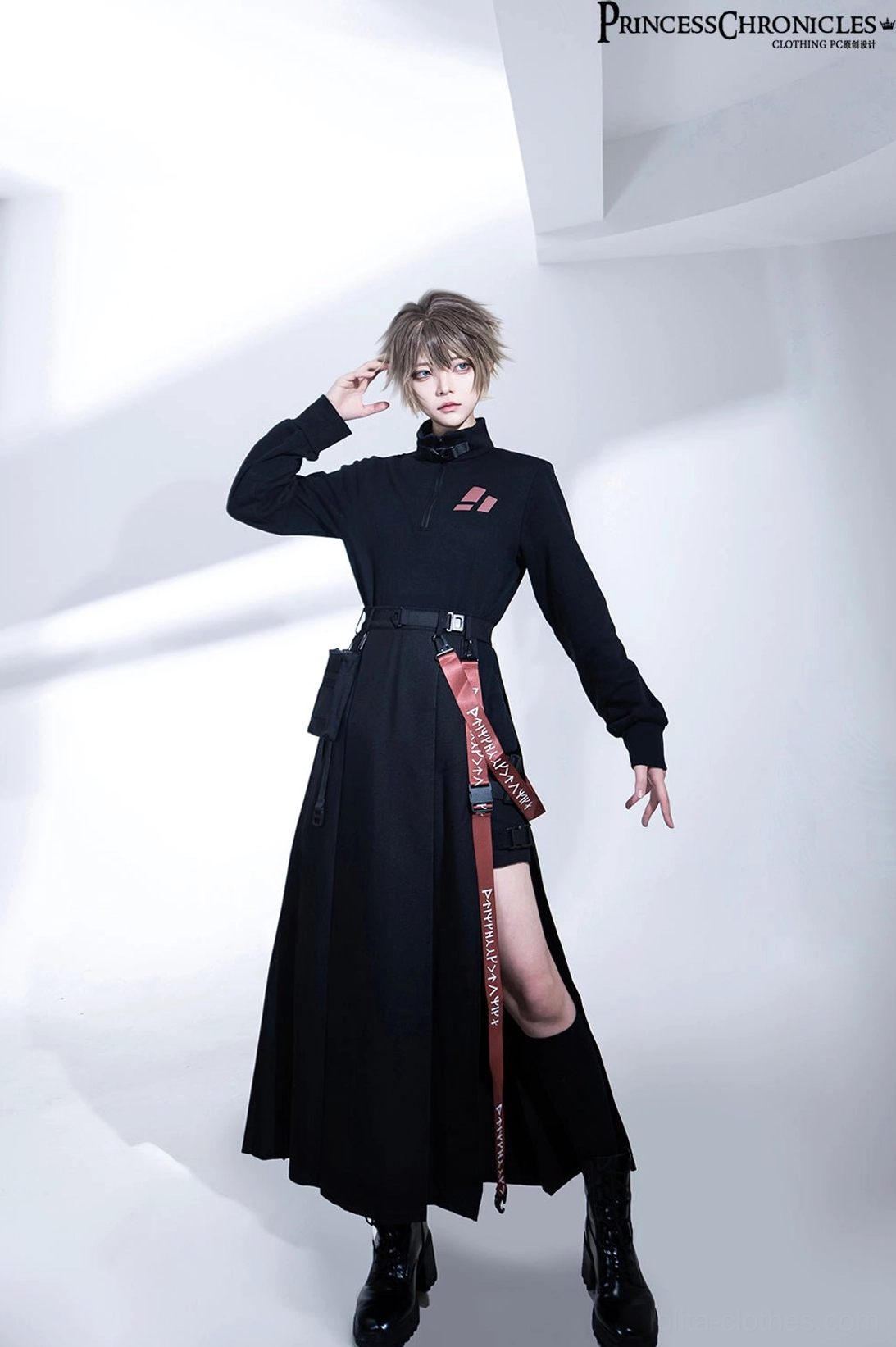 Full body frontal techwear ensemble display with natural hand positioning and matching black color scheme