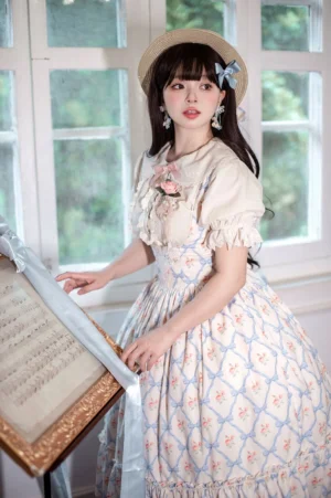 Vintage geometric floral print Lolita dress half side front view Peter Pan collar ruffled sleeves high-waisted midi skirt