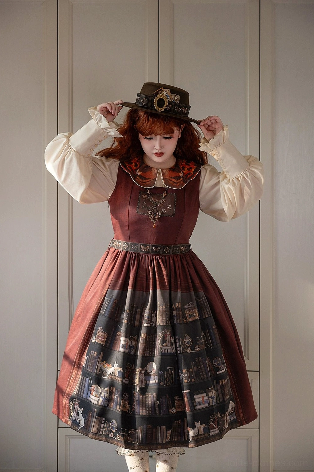 Burgundy classic Lolita JSK dress with off-white blouse and top hat model styling front view