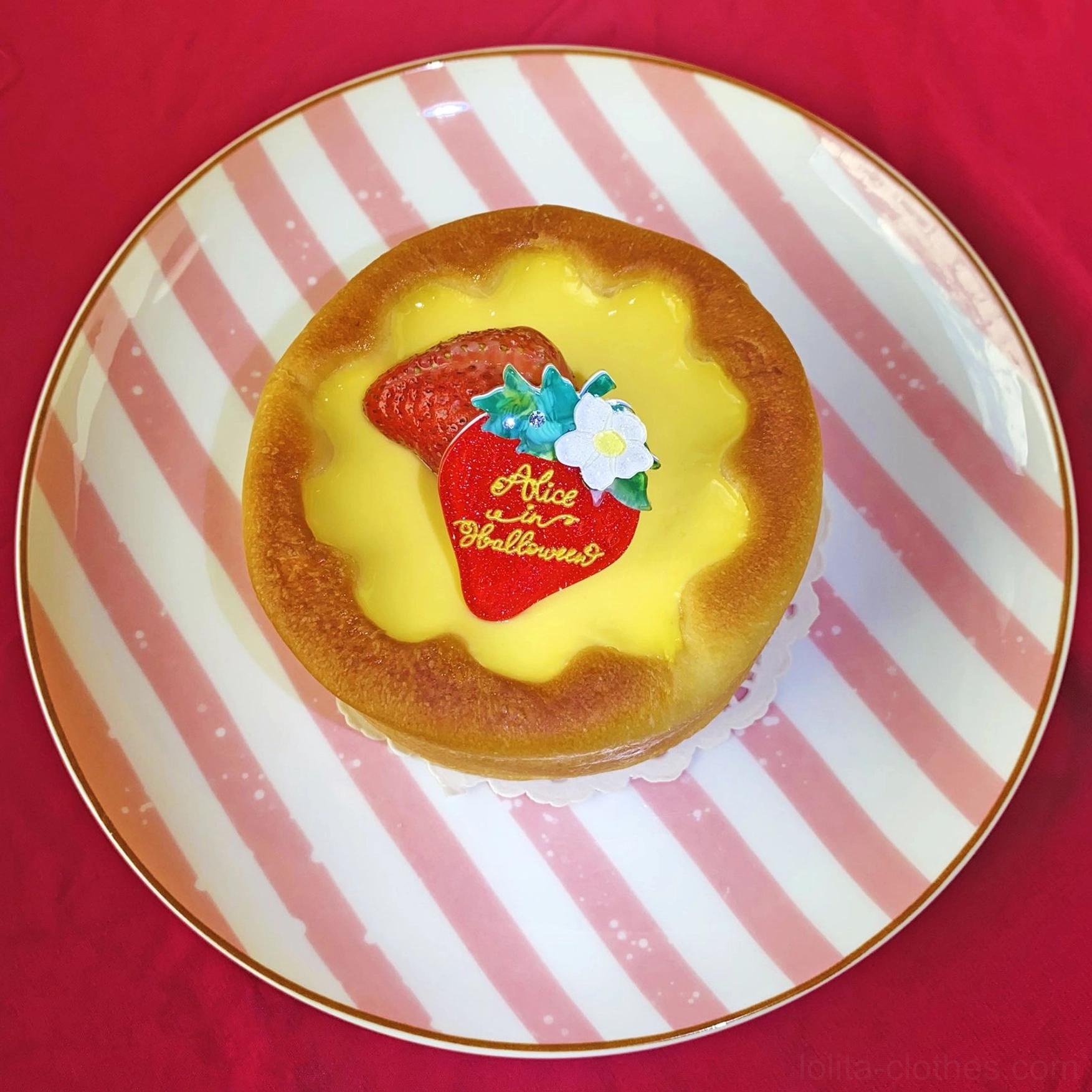 Glitter strawberry brooch lolita accessory with white flower and green leaf details on plate
