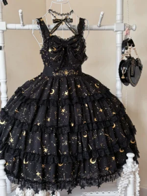 Gold foil stamping Celestial Whispers lolita jumper skirt dress front view on white clothing rack with matching choker necklace showcasing big front bow and multi-tiered ruffled skirt silhouette