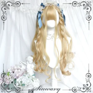 Light golden blonde wavy Lolita wig with straight bangs worn on display mannequin in romantic white curtain setting decorated with angel ornament and flower bouquet, styled with blue bow hair accessories