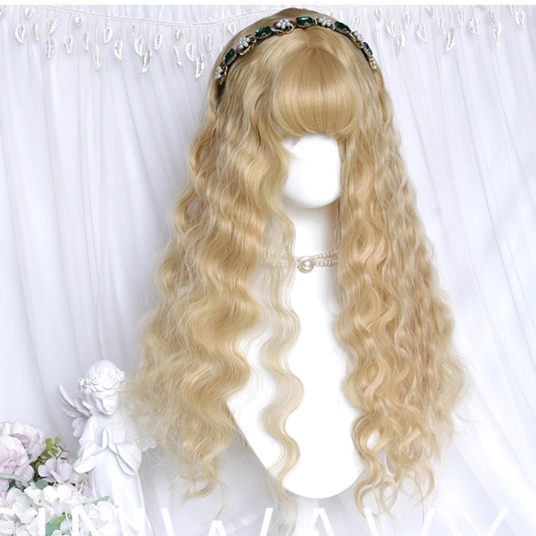 Golden long curly lolita wig on mannequin with gem-encrusted headband and pearl necklace full length display white curtain purple flowers
