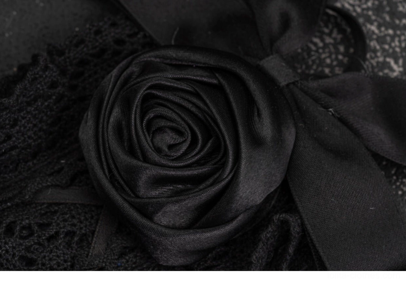 Gothic black rose hairband macro close-up view 3D layered satin rose ribbon bow smooth satin fabric texture detail