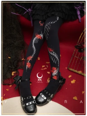 Full-length black Halloween gothic lolita pantyhose featuring red spider lily and grey skeleton leaf prints, styled with black ruffled lolita skirt and Mary Jane shoes, showcasing crescent moon thigh tattoo design