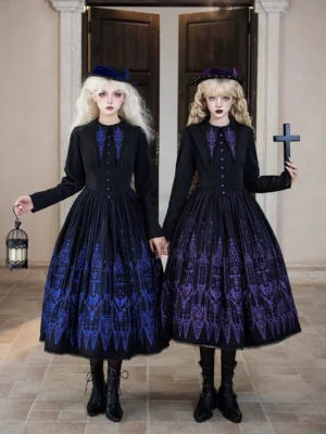Full-body front view of gothic church embroidery lolita one-piece dress worn by two models in a stone-tiled church hallway, featuring black base with detailed embroidery, structured shoulders, and midi-length pleated skirt paired with vintage top hats and gothic accessories