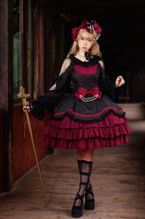 Gothic classic lolita dress set with wine red ruffled skirt and black sheer lantern sleeves featuring pearl-trimmed waist bow and multi-layered tiered hem on blonde model in vintage hallway