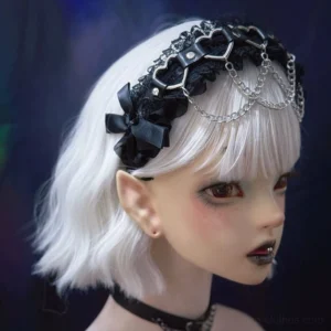 Dark gothic lace hair headdress featuring black satin bow and triple-layer silver chain decoration, left side close-up view on elf-eared BJD doll model, paired with black choker showing detailed lace trim