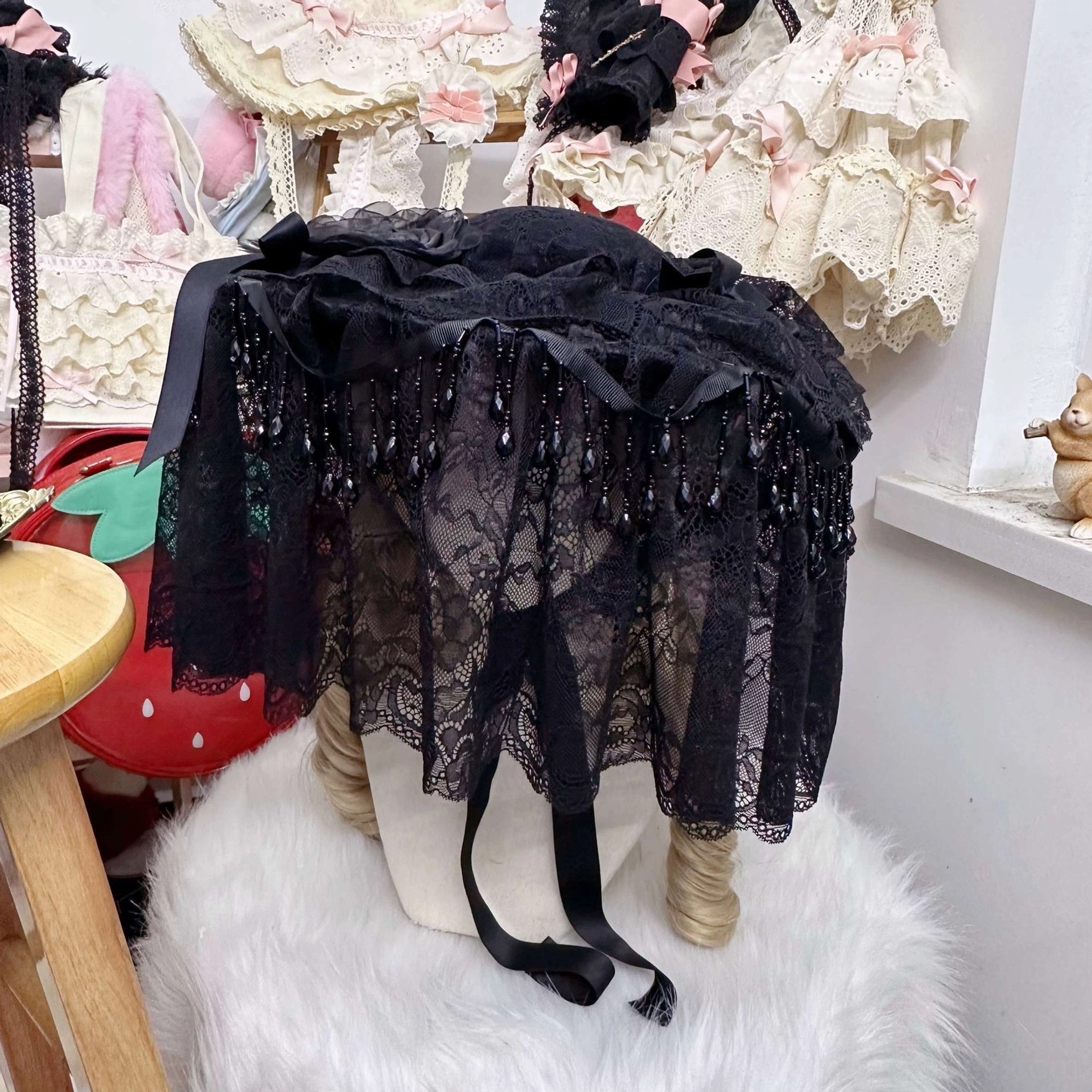 Gothic Lolita accessories collection including widow hat spider necklace and lace hair pieces styling guide