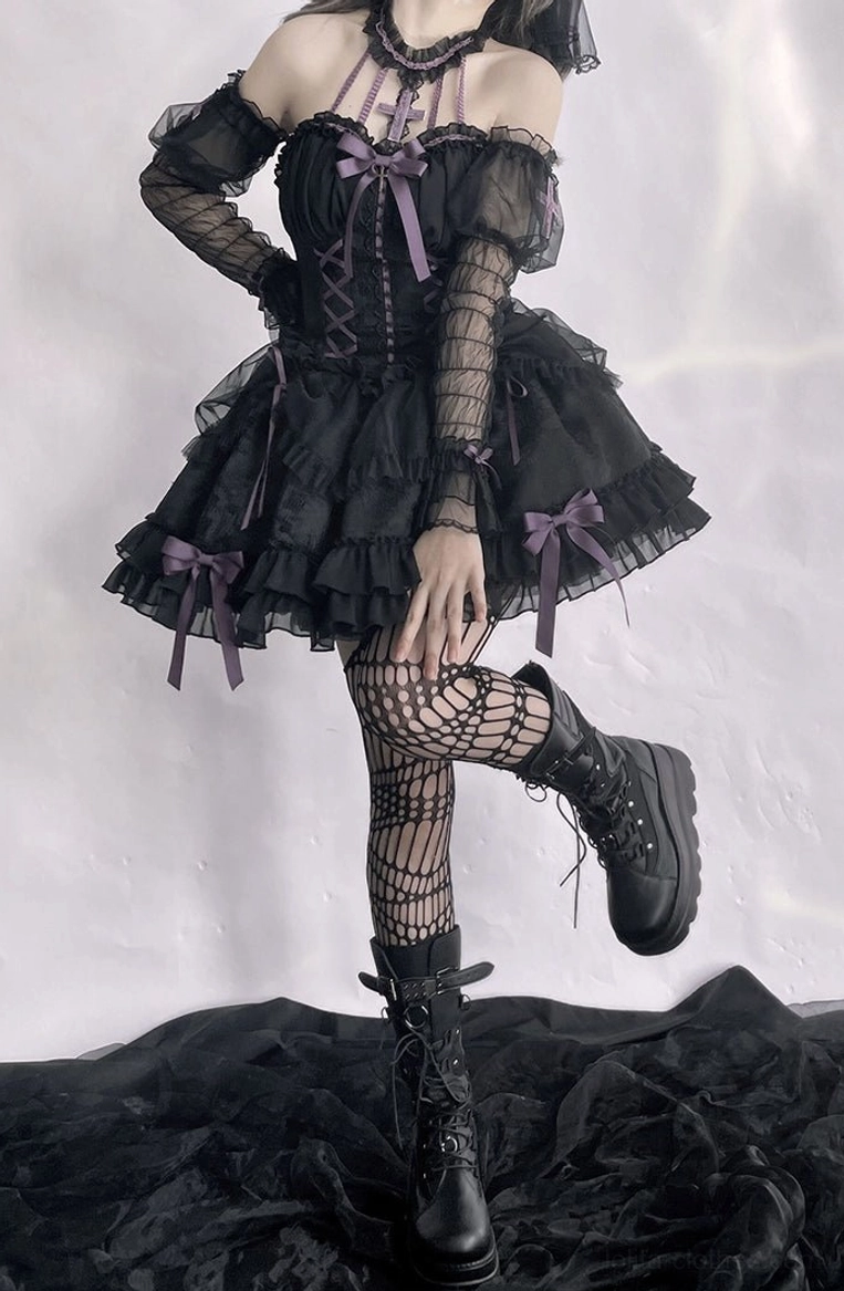 Gothic Lolita arm cuffs with embroidered cross design and multi-layer mesh ruffles for dramatic silhouette in Lolita fashion photography and events
