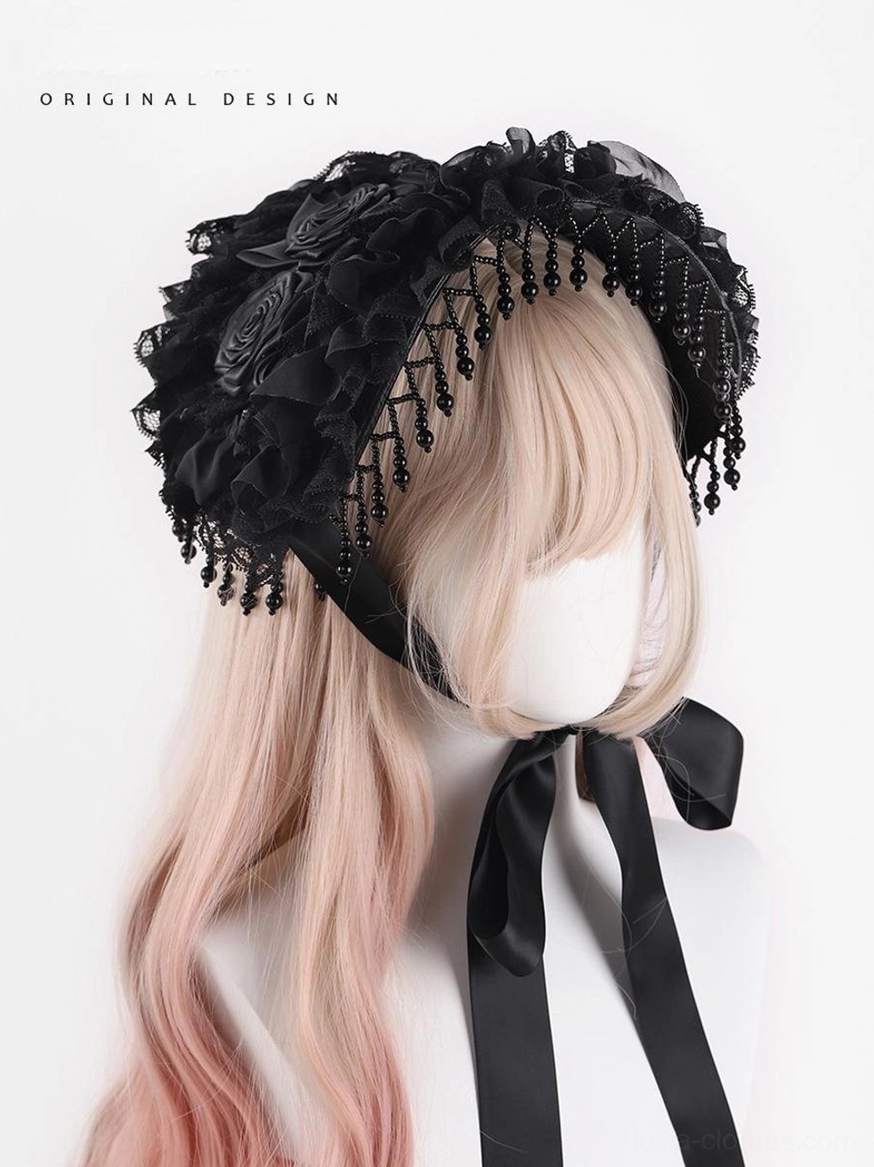 Close-up front view of Gothic Lolita black bonnet headdress featuring delicate hand-knotted beaded fringe, layered ruffled lace foundation, and detailed handmade fabric rose decorations on mannequin