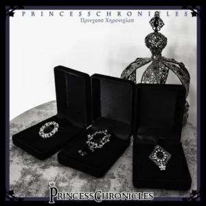 Gothic Lolita black gemstone brooch styled with matching dark silver bracelet and ring jewelry set