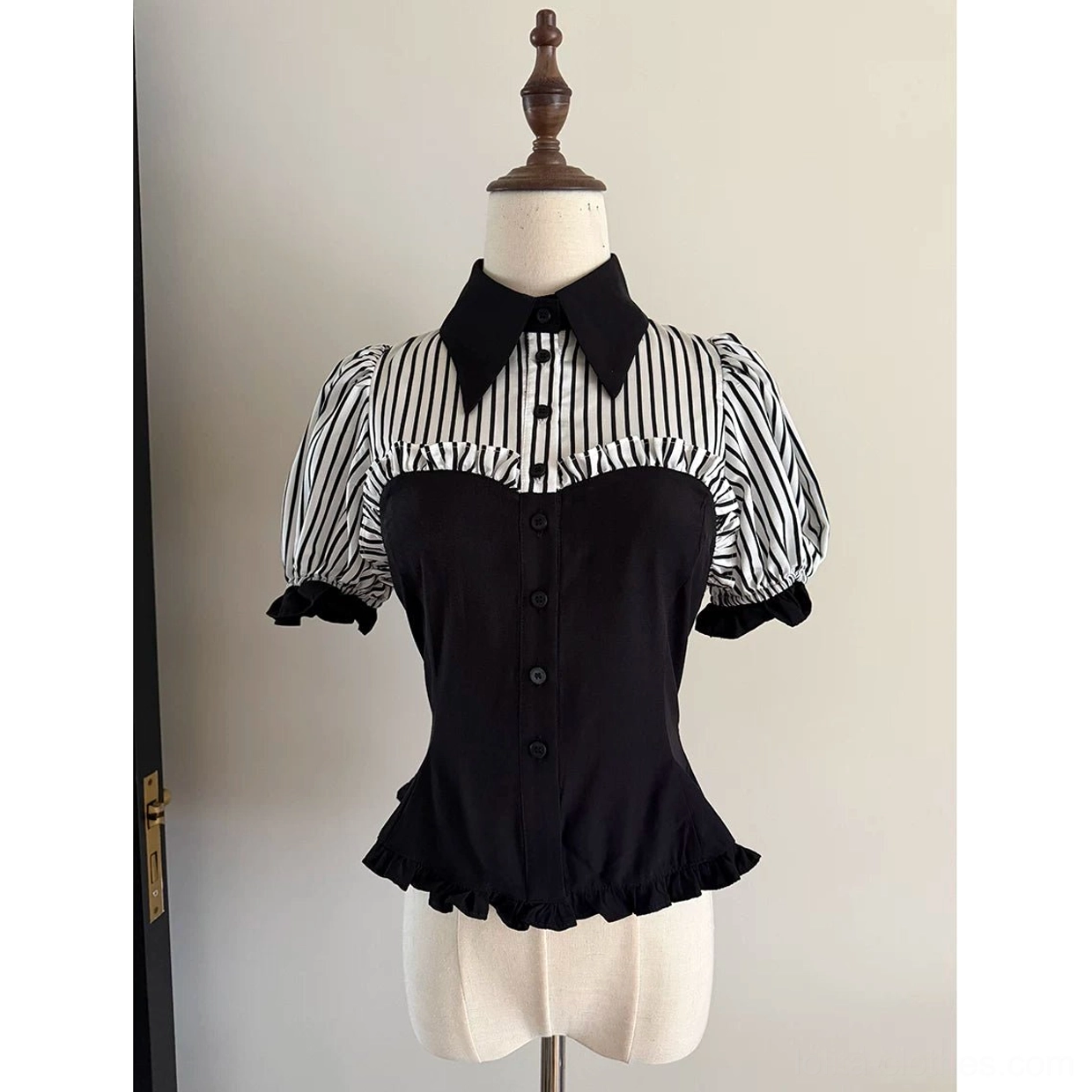 Black striped gothic lolita blouse standalone front view showing button bodice and elegant puff sleeve construction with ruffled trim