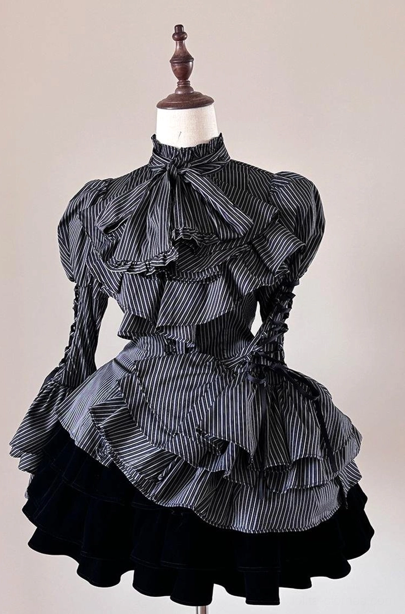 Black base striped Lolita blouse with delicate white stripes showcasing fitted waist, ruffled jabot neckline and lace-up puff sleeve details on mannequin with black velvet skirt