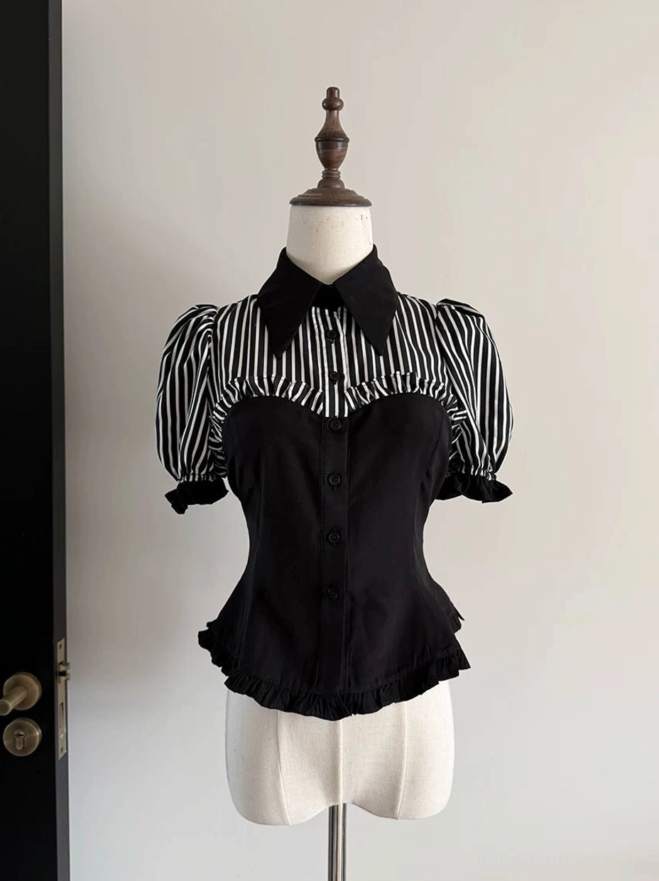Gothic lolita black striped patchwork blouse front flat display with contrast patchwork design and puff sleeves on dress mannequin