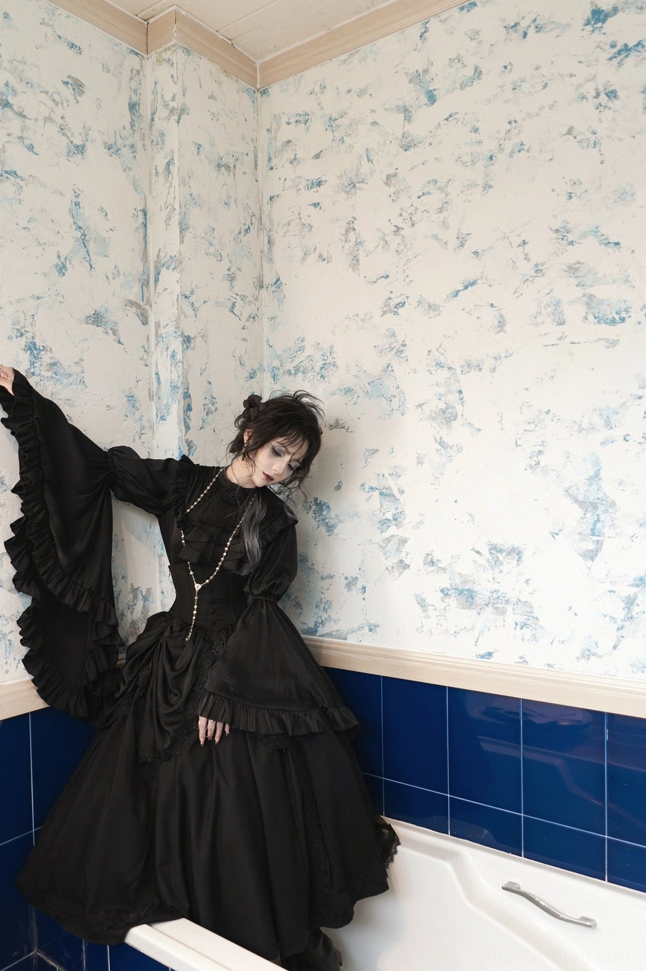 Gothic lolita blouse fabric detail showing 100% polyester vertical stripe weave, durability, and premium construction quality
