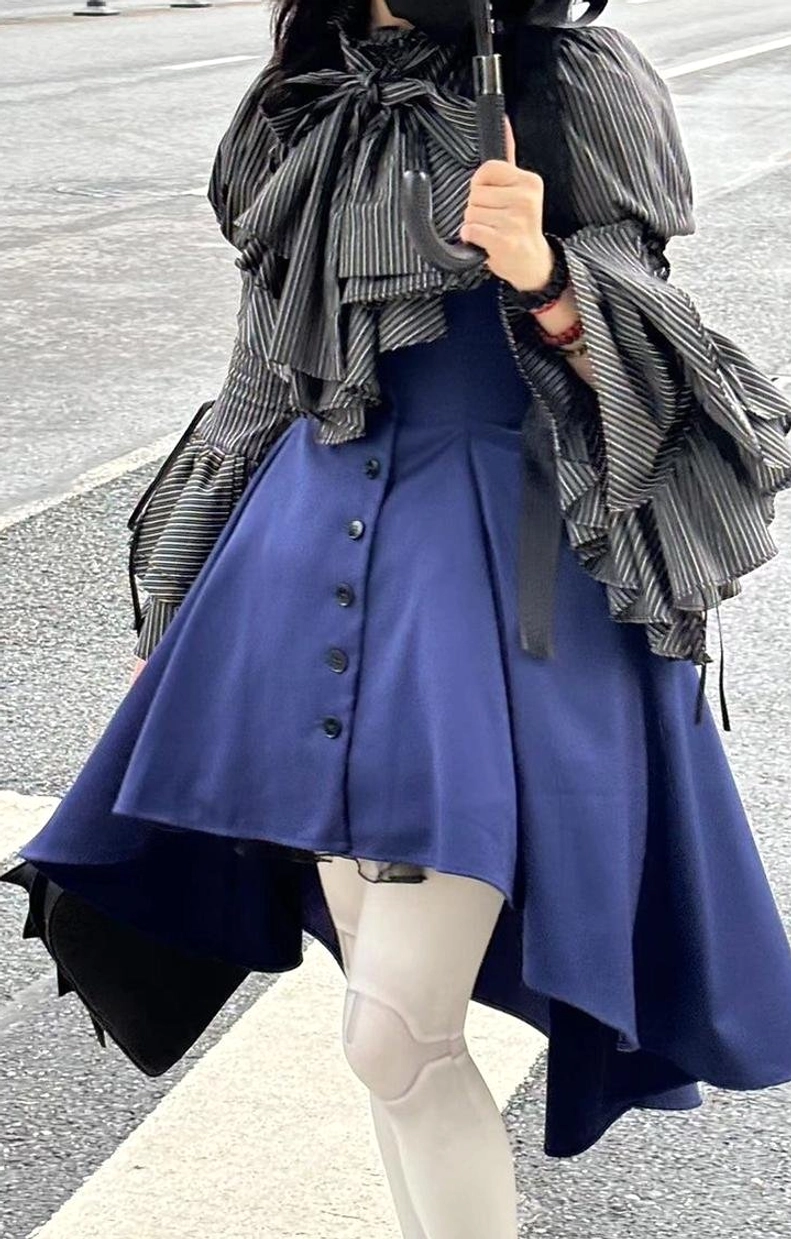 Fitted waist detail of Gothic Lolita blouse showing high-waisted design with adjustable back tie system creating flattering silhouette characteristic of Lolita fashion