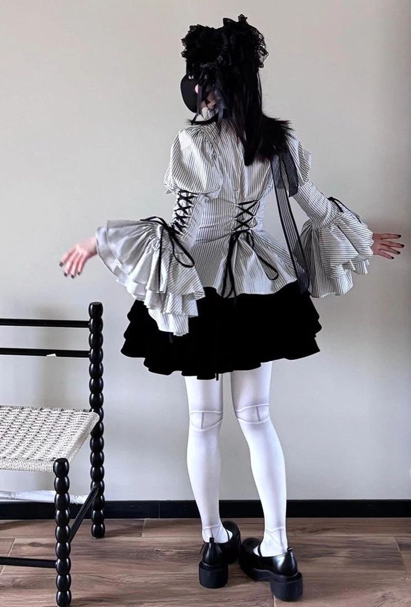 Product detail shot of interchangeable necktie and ornate jabot accessories included with Gothic Lolita striped blouse purchase