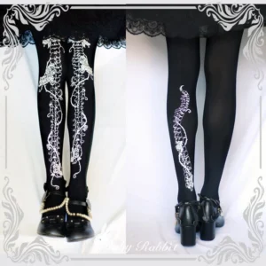 Gothic lolita bone and rose print pantyhose black base with silver skeleton vine motif shown in split front and rear view display against black ruffled lolita skirt and buckle heels