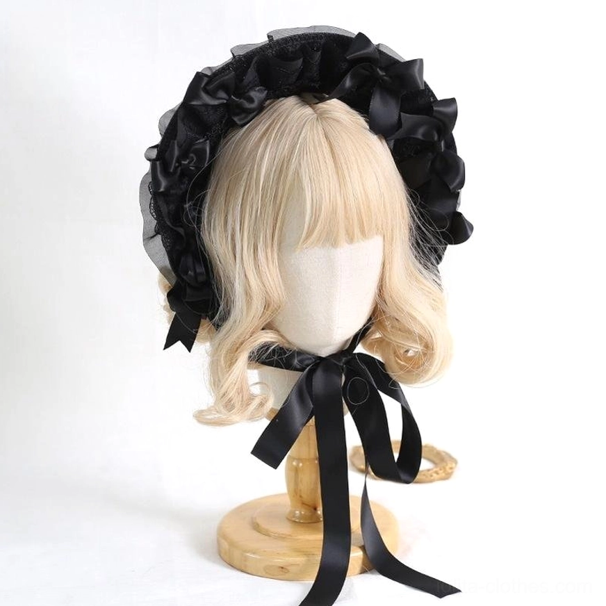 All-black gothic lolita bonnet hat with ruffled lace trim and black satin bow detailing classic aesthetic