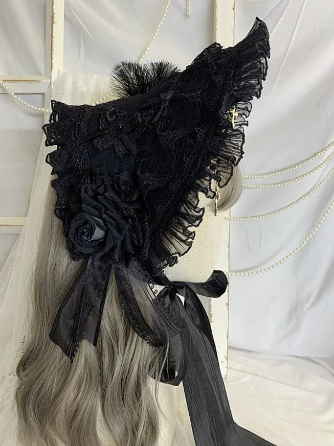 Gothic Lolita black velvet lace bonnet with rose flower embellishments, right rear side view, satin fastening straps, elegant silhouette