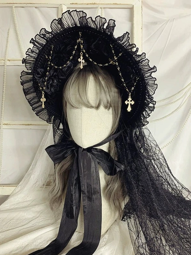 Gothic Lolita bonnet headdress with detachable black mesh veil front view, ruffled mesh brim, gold cross pendant chains, black satin ties