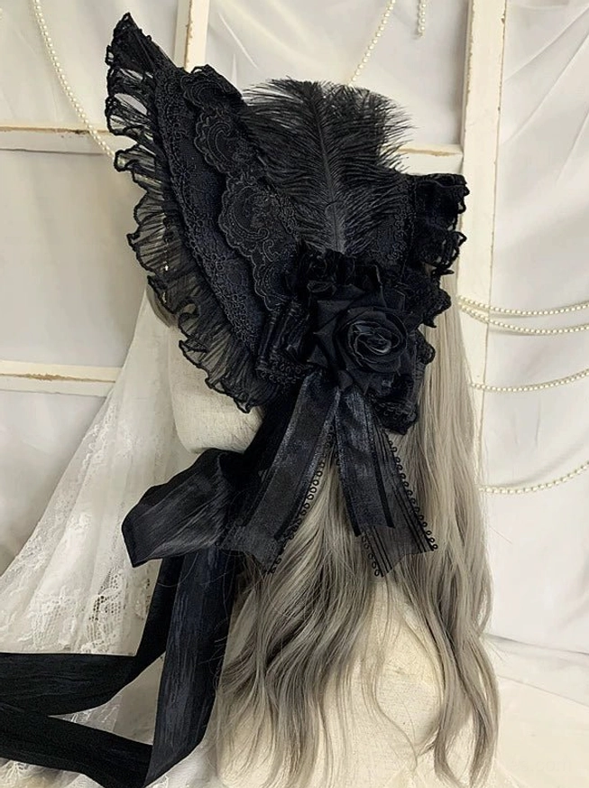 Gothic Lolita bonnet headdress with rose embellishments and ostrich feather detail, left rear angle, ruffled lace fabric, black satin fastening ribbons