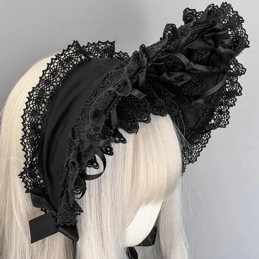 Gothic lolita lace bonnet right rear side view with oversized detachable bow, lace edging, black satin ribbon details on mannequin
