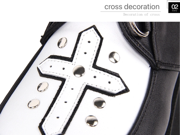 Close-up macro view of hand-stitched cross decoration metal studs flat top-down detail stitched white leather cross silver round metal studs d-ring hardware