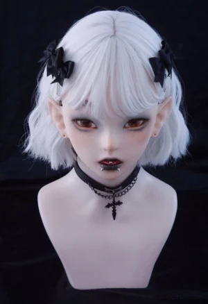 Gothic Lolita bow headdress with silver cross pendants on pale BJD doll frontal headshot wearing elegant dark coordinate