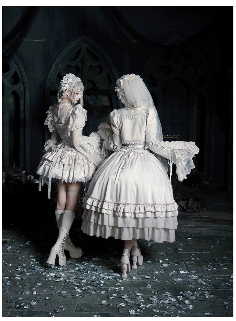 Gothic lolita styling angle showing bustier construction adjustable straps teardrop pendants from side profile view