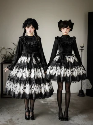 Gothic lolita butterfly print dress front full-body view two models standing studio setting ruffled collar layered butterfly skirt black stockings