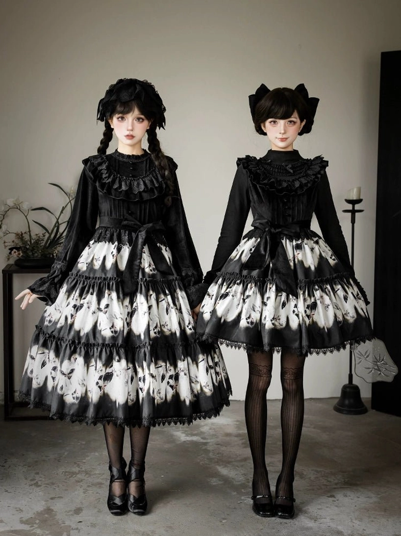 Gothic lolita butterfly print dress front full-body view two models standing studio setting ruffled collar layered butterfly skirt black stockings